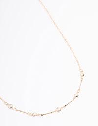 Gold Encased Pearl Station Necklace - link has visual effect only