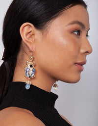 Gold Blue Swirl Beetle Earrings - link has visual effect only